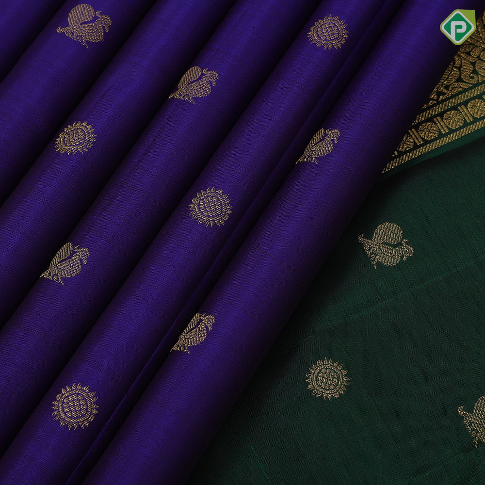 Indigo blue gold zari rudraksham annam butta motifs contrast green gold zari retta pett border traditional silk saree