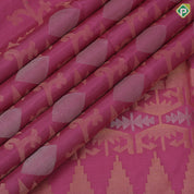 Pinkish orange silver gold zari diamond geometrical design self gold zari lines border soft silk saree