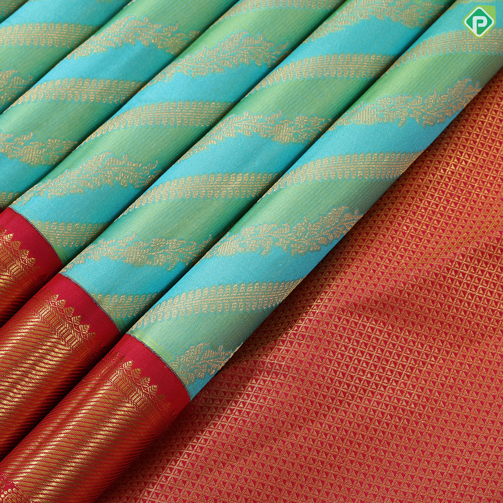 Pista green sky blue and gold zari cross lines design contrast pink gold zari border grand bridal silk saree