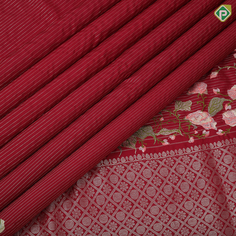 Maroon red silver gold zari stipes and four side floral embroidered self silver gold zari zig zag line border embroidery silk saree