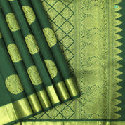 Forest Green Colour Big Chakra Inside Peacock And Floral Motifs Traditional Silks Saree