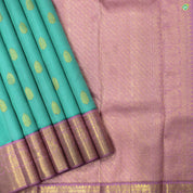 Rexona Green Peacock and Button Gold Zari Border Pure Kora Silk Saree