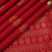 Tomato red gold zari thilagam and double gaja yaali butta self gold zari rettapattai border traditional silk saree