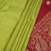 Manthulir green gold zari small butta double color partial temple one side border silk saree