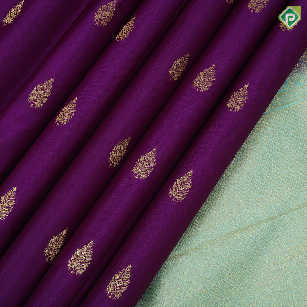 Purple gold zari leaf thilagam butta pista green gold zari multi designed lines border traditional silk saree