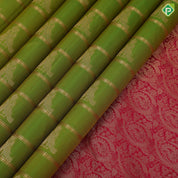 parrot green gold zari velthari lines double peacock butta rani red gold zari meena work border traditional silk saree