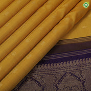 Mango yellow gold zari fancy star potted annam butta contrast blue gold zari tri lines meena work koorvai border traditional silk saree