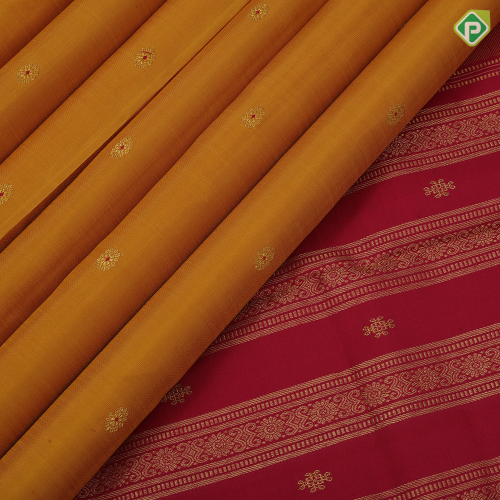 Mustard yellow chakaram design maroon flower border design traditional silk saree