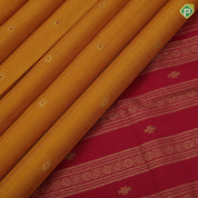 Mustard yellow chakaram design maroon flower border design traditional silk saree