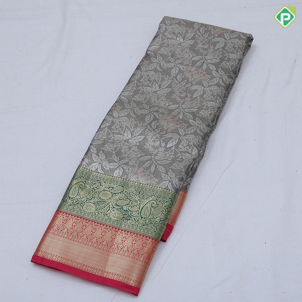 Pista green silver zari and multi color floral design contrast double color center border tissue art silk saree