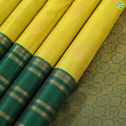 Lemon yellow with mango butta design dark green gold zari multi lines border Traditional silk saree