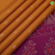 Mustard yellow gold zari fancy butta design grand pallu rani pink gold zari temple border soft silk saree