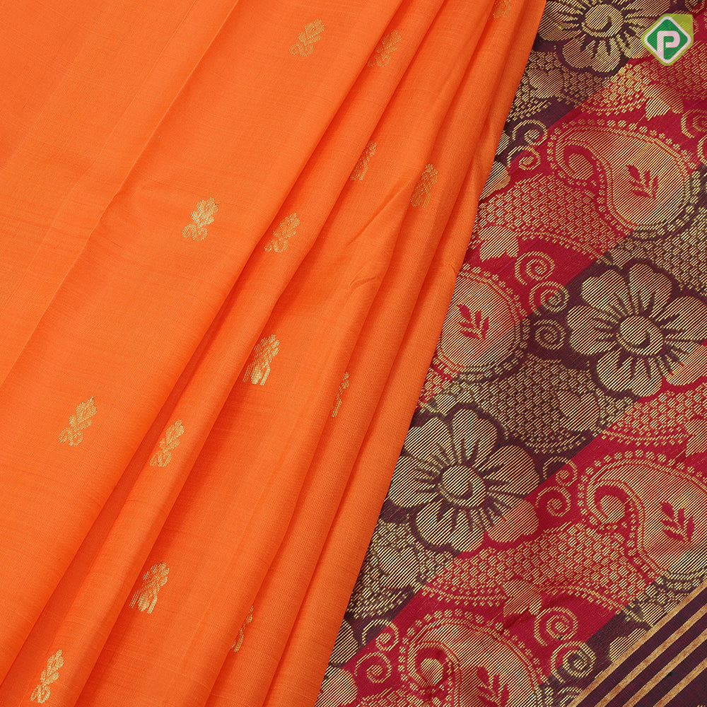 Dark orange gold zari fancy flower butta green red gold zari big diamond design one side border silk saree
