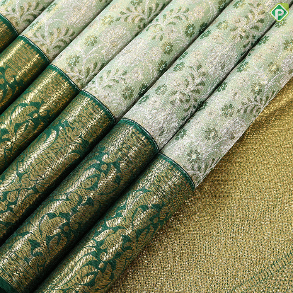 green base with silver and gold zari grand hand woven gold zari lotus design border exclusive bridal silk saree