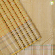 Lemon yellow silver zari checks gold zari butta self silver gold zari meena work border Navratri special silk saree