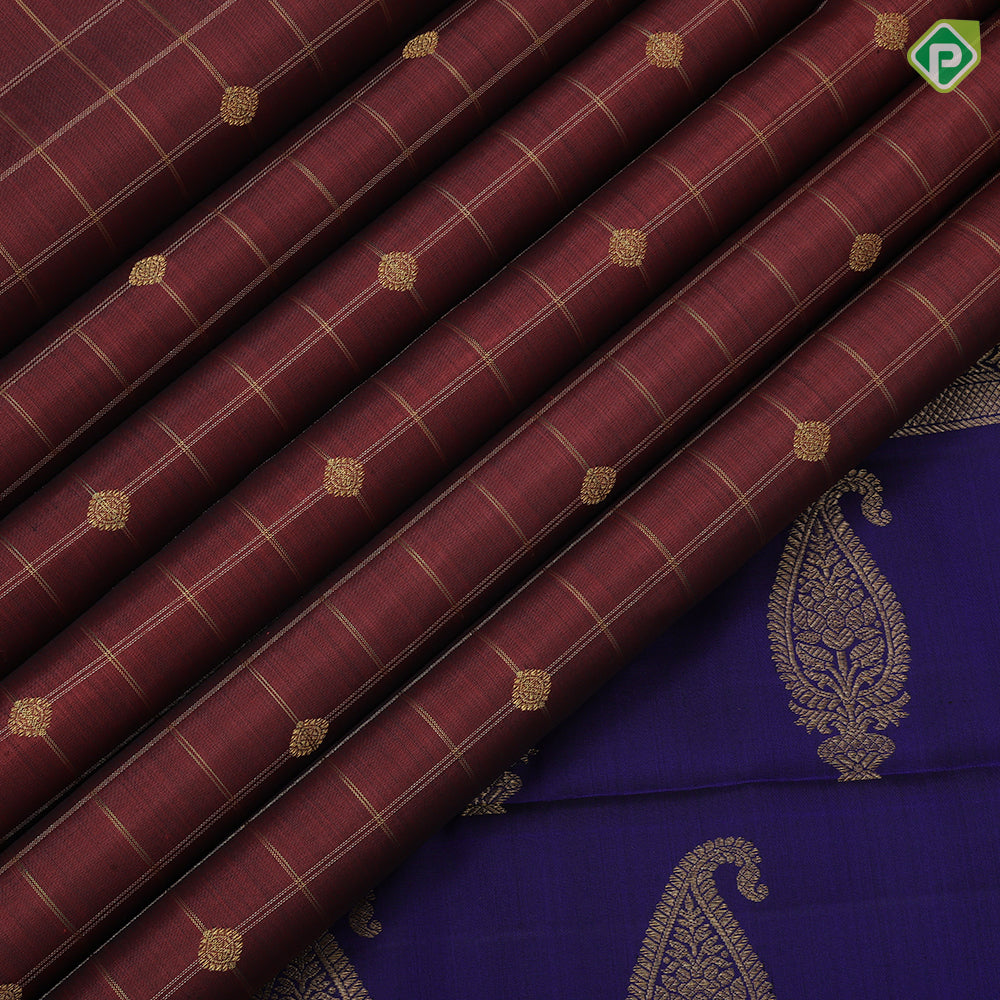 Rust color gold zari checks with rudraksham butta berry blue gold zari peacock edge border traditional silk saree