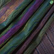 Multi color embossed flames design peacock blue copper zari border trendy silk saree