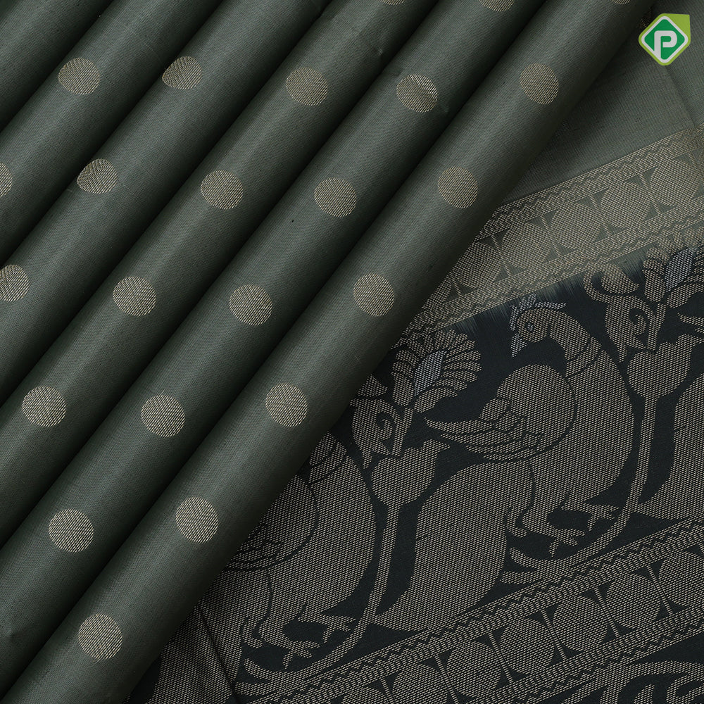 Tea green gold zari chakkaram butta motifs olive green rangoli multi color lines mid gold zari border soft silk saree