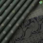 Tea green gold zari chakkaram butta motifs olive green rangoli multi color lines mid gold zari border soft silk saree