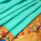 Rexona Green Thousand Butta Contrast Orange Meena Work Border Gadwal Silk Saree