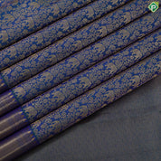 Peacock green gold zari elephant grand floral design self gold zari zig zag border grand bridal silk saree