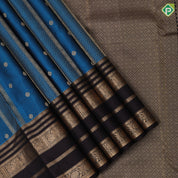 Deep sea blue gold zari butta and design bars contrast brown gold zari multi lines border gift silk saree