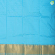 Light pink gold zari buttas into thick checks design sea blue gold zari zig zag border pattu lehanka paavadai