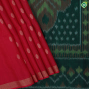 Tomato red gold zari chakkaram butta motifs self gold zari border contrast ikkat design pallu linen soft silk saree