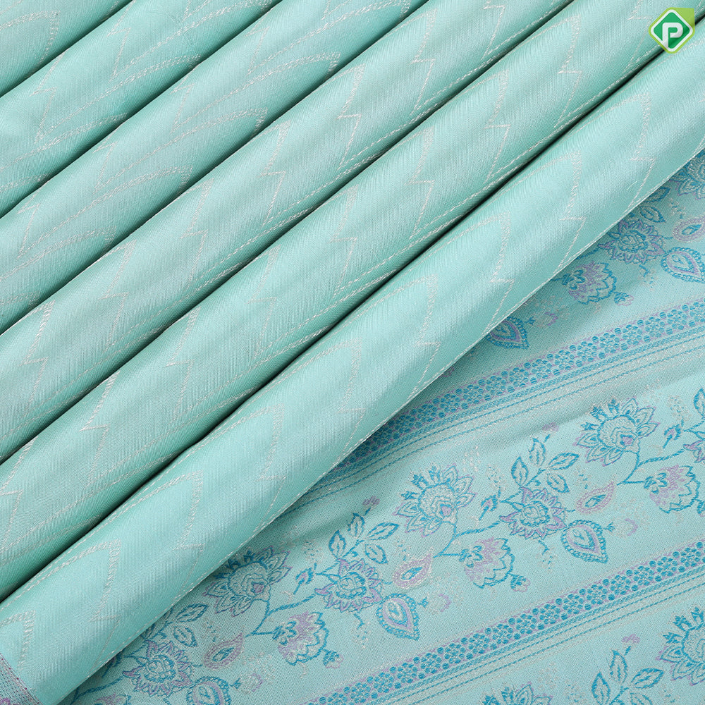 Suffire green silver zari zig zag waves design self multi color pythonic border grand bridal silk saree