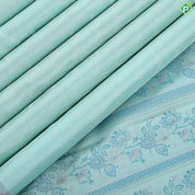 Suffire green silver zari zig zag waves design self multi color pythonic border grand bridal silk saree