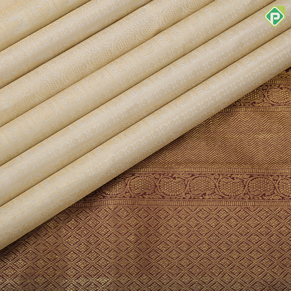 White gold zari hundred design buttas maroon gold zari partial bavanji border exclusive bridal silk saree