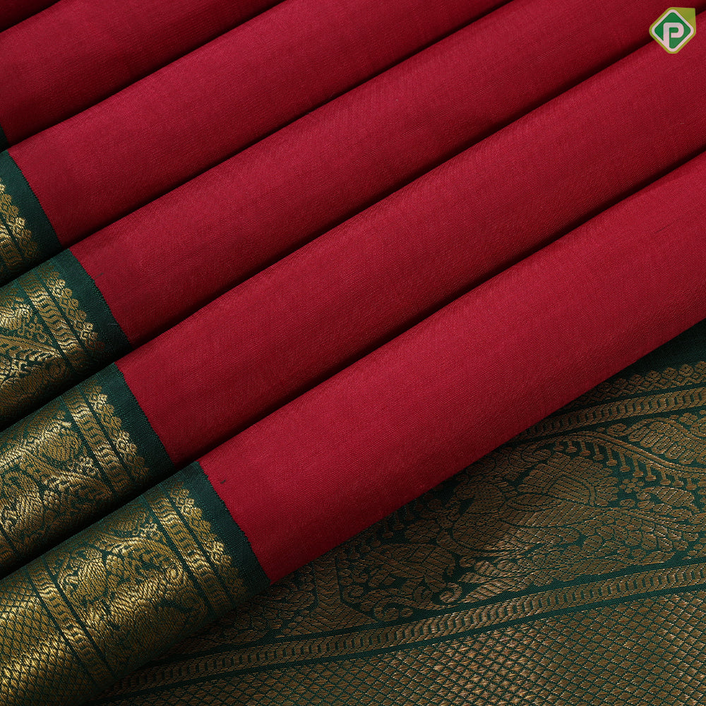 Maroon red plain weaved design bottle green gold zari peacock arch butta border madisar 9 yards silk saree
