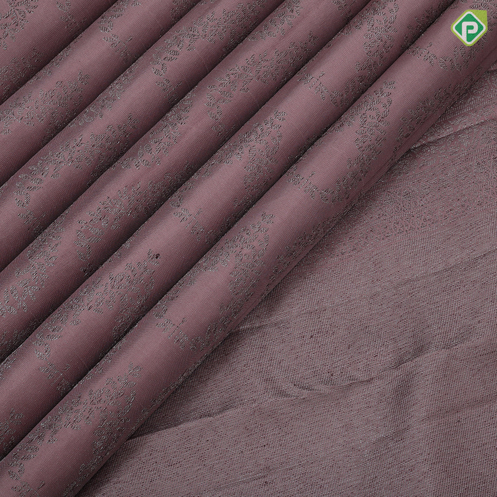 Peach onion with neem zari thilagam floral design self color border self weaves silk saree
