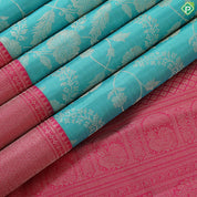 Cool green silver gold zari grand floral design contrast pink border grand bridal silk saree