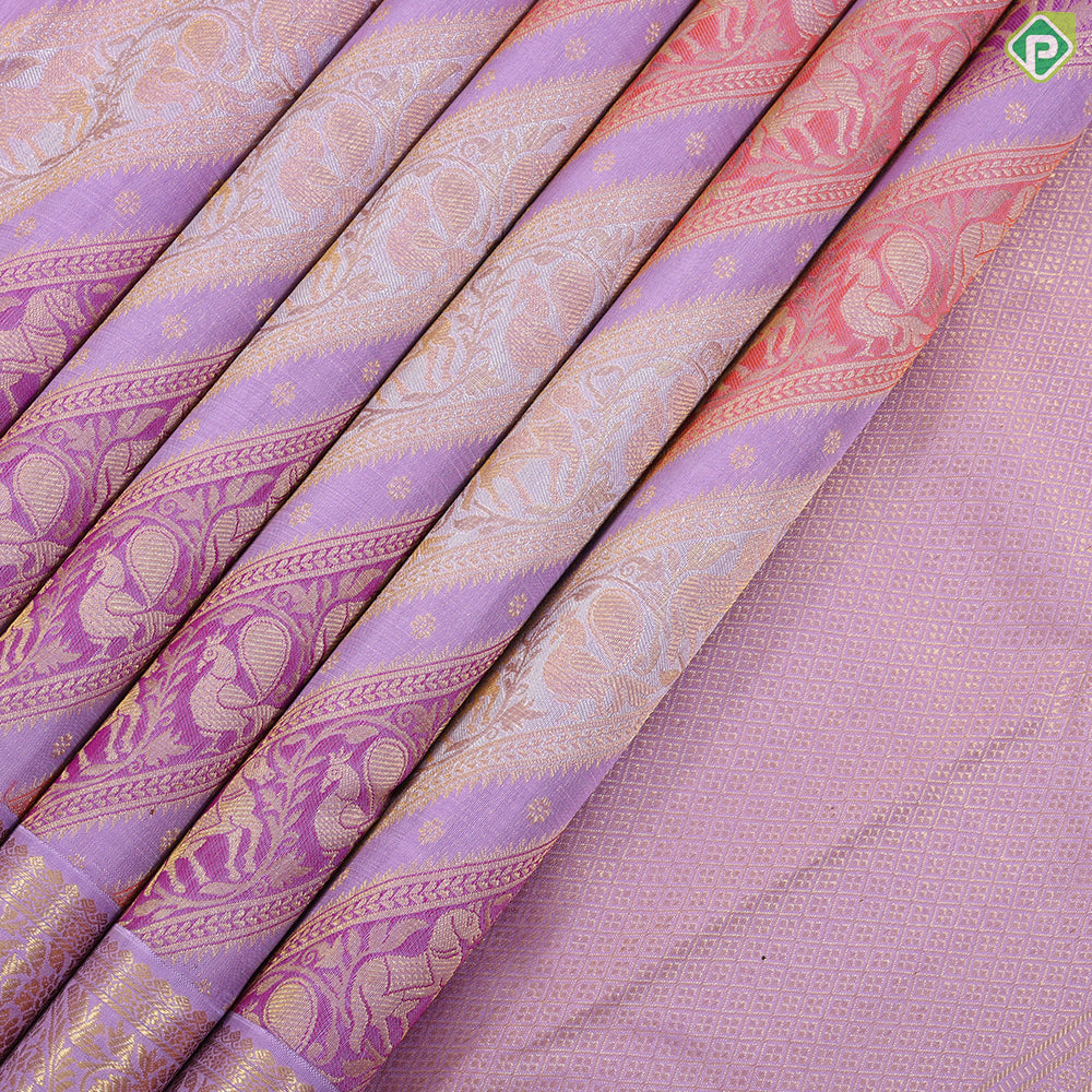 Lavender base multi color silver gold zari butta rangoli lines self mango butta border exclusive bridal silk saree