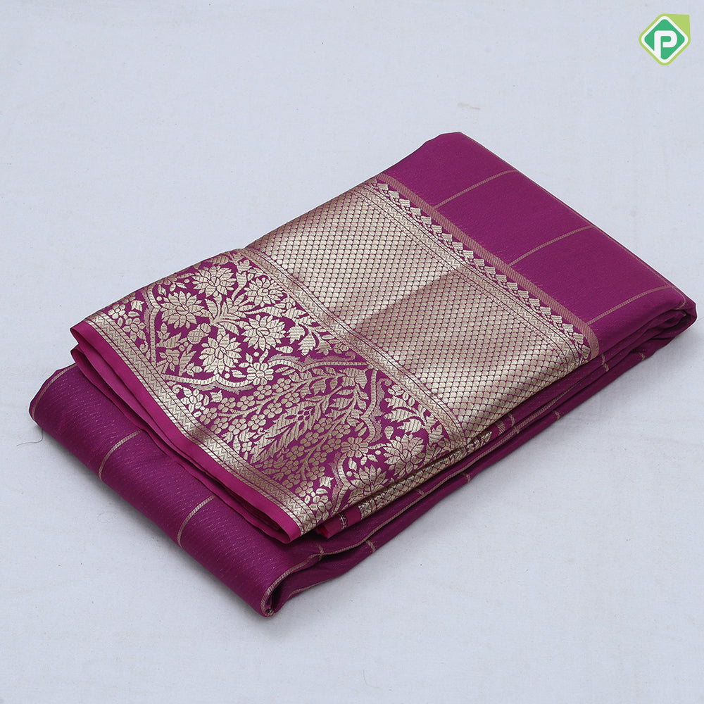 Rani pink gold zari double peacock deer round butta self gold zari flower and diamond border art silk saree