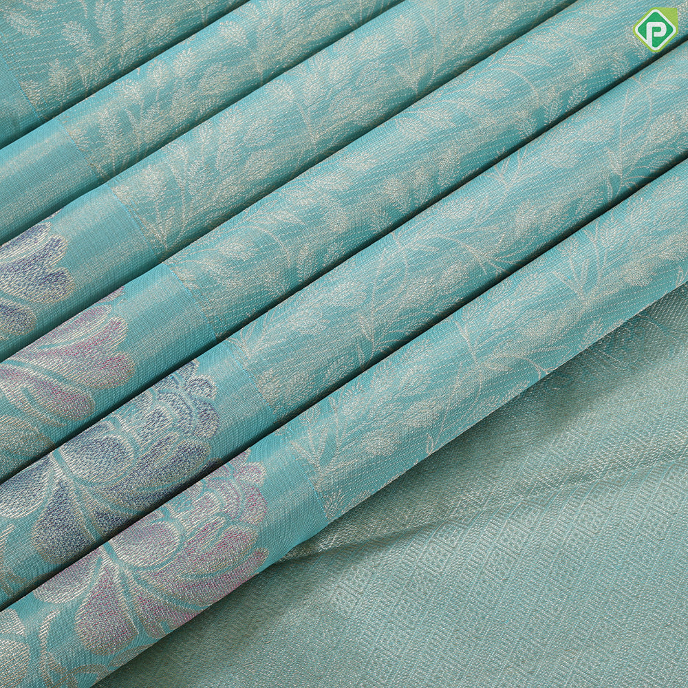 Sea green gold zari grand floral tissue weaved design self meena work floral border trendy tissue silk saree