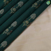 Bottle Green Gold Zari Flower Design Cream Colour Peacock Chagaram Border Design Traditional Silk Saree