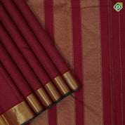 Maroon gold zari checks design self gold zari bavanji green edge border koorai pattu saree