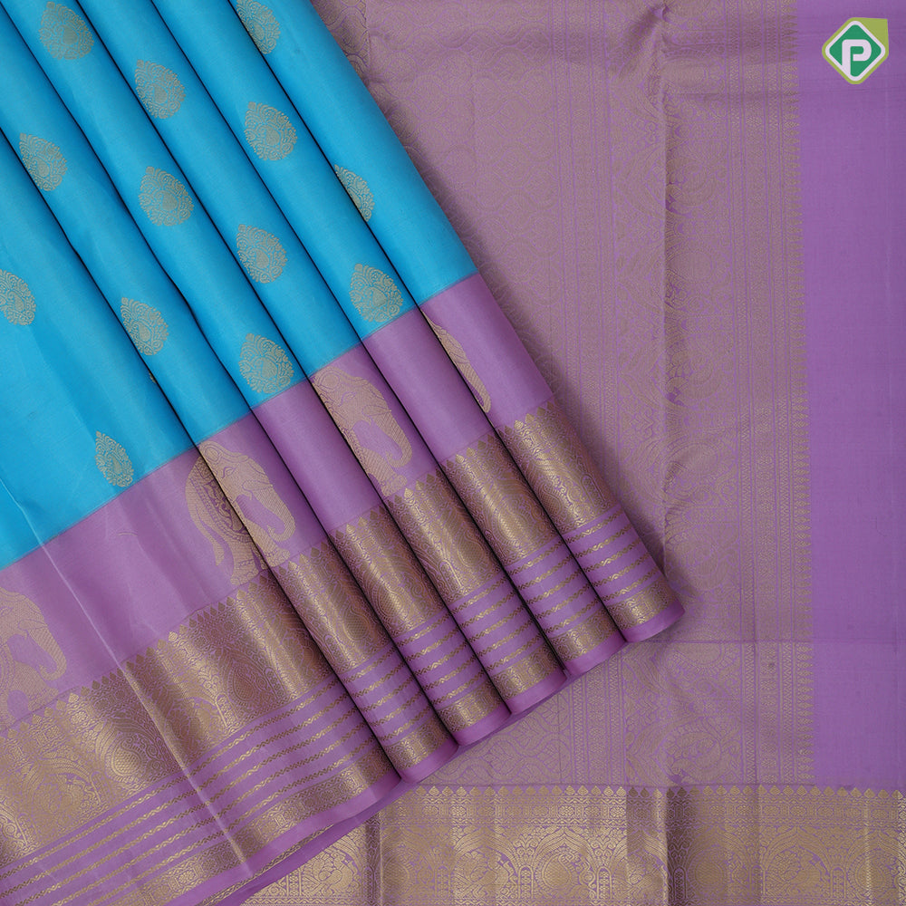 Sky blue gold zari Thilagam flower butta design lavender gold zari three line design border traditional silk saree