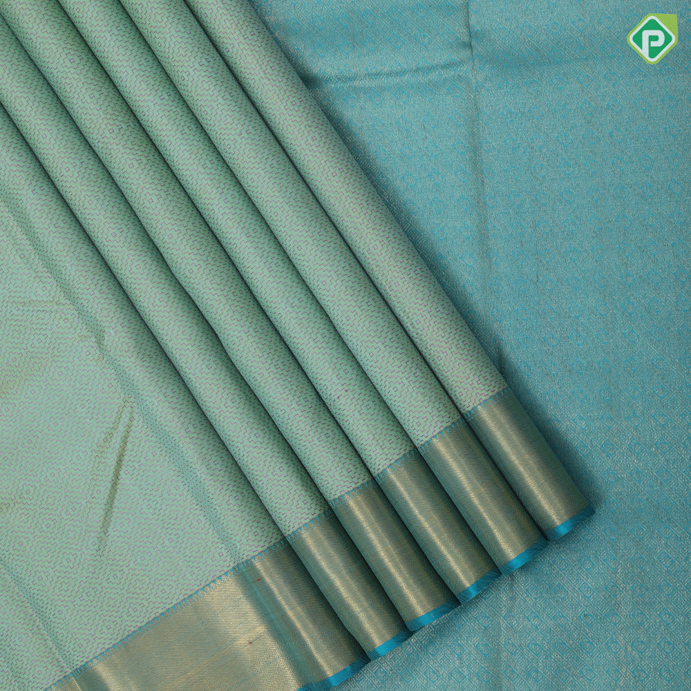 Pista green pink silk thread work embroidered design rexona green gold zari bavanji border traditional silk saree