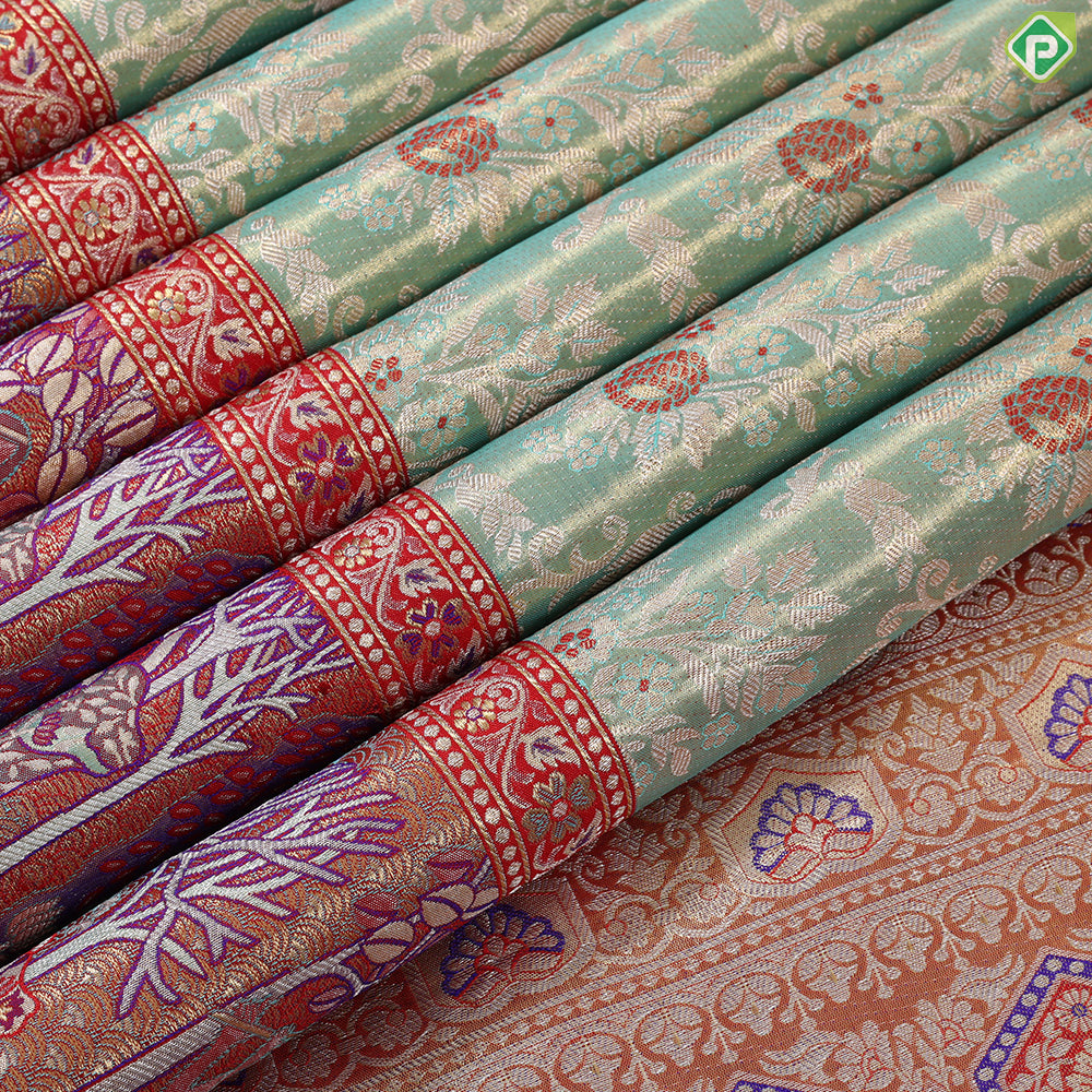 Pista green silver gold zari grand floral meena work design contrast pythonic border grand bridal silk saree