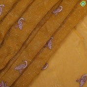 Mustard yellow tissue effect flamingo butta embroidered design multi color cut work border hollywood fancy saree
