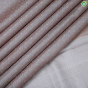 Dark peach silver zari zari by zari butta and shimmer design self cow and tree border master weaved pichwai silk saree