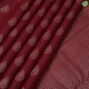 Beetroot maroon vairaoosi thilagam butta self copper zari mayilkan border traditional silk saree