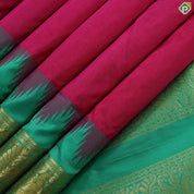 Reddish pink plain weaved design contrast green gold zari double peacock butta temple border madisar 11 yards silk saree