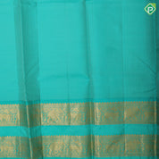 Pinkish orange silver gold zari grand floral design rexona green gold zari retta patti border pattu paavadai lehanka