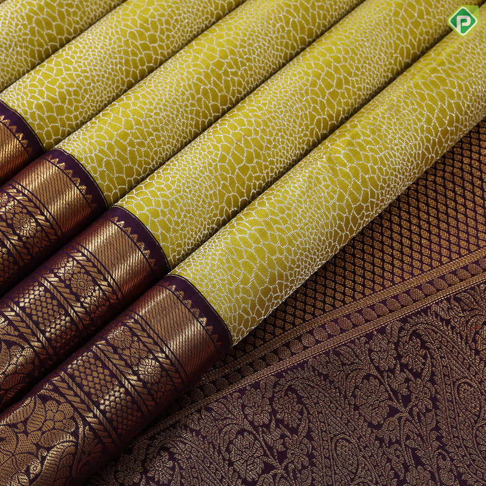 lemon yellow silver zari geometric design contrast purple gold zari border exclusive bridal silk saree