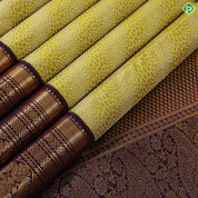lemon yellow silver zari geometric design contrast purple gold zari border exclusive bridal silk saree