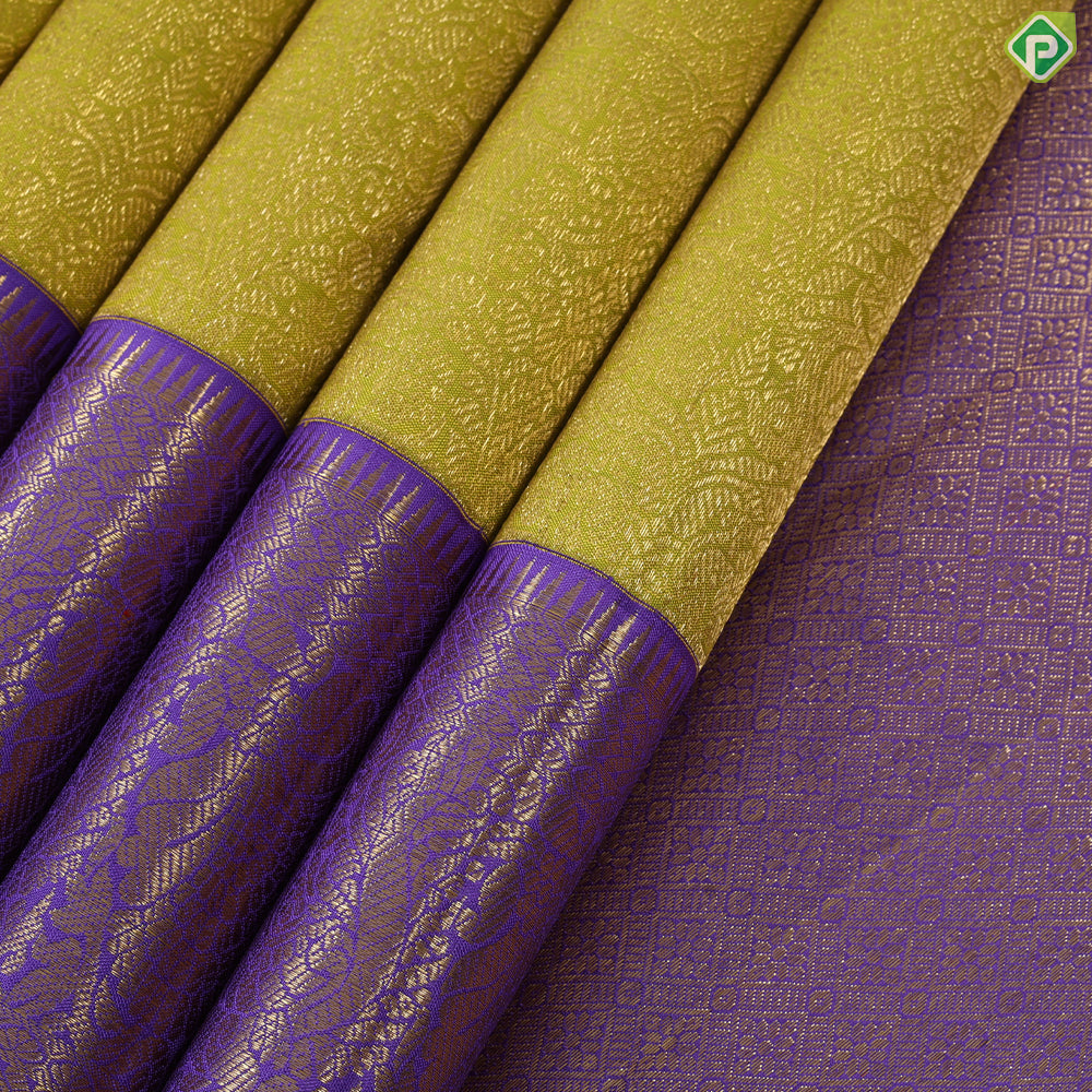 Lemon Green Grand weaved Contrast Lavender Border Exclusive Bridal silk saree
